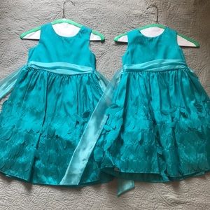 Rare Editions turquoise “feathered” girl’s dress